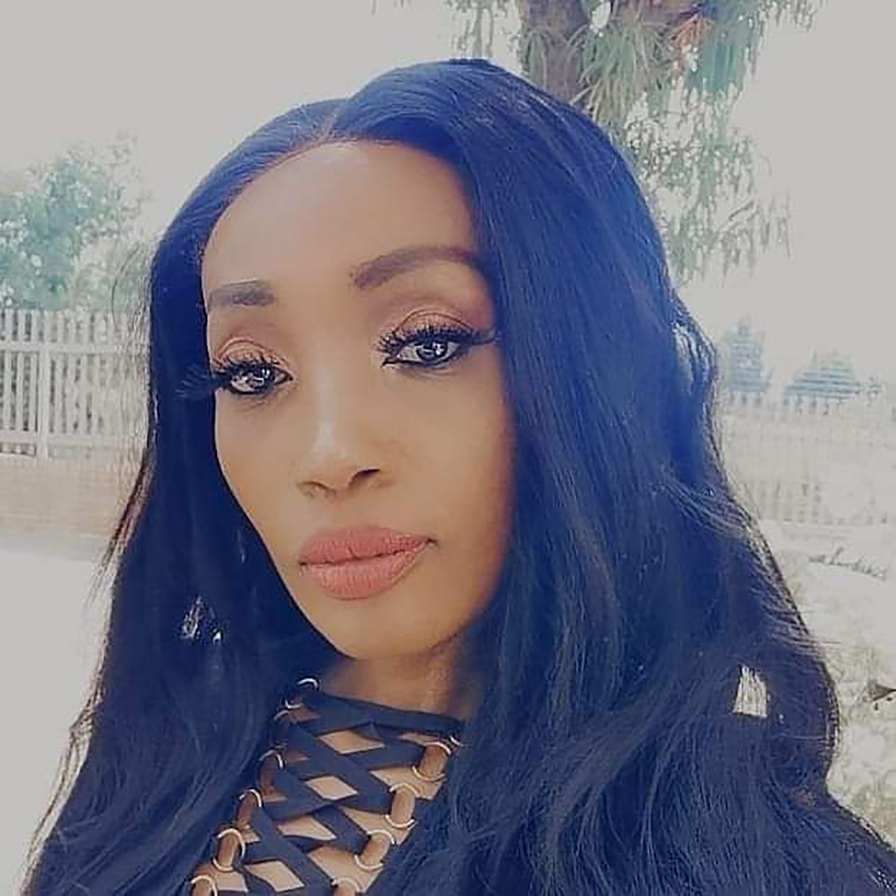 Sophie Ndaba known as Queen Moroka for generations looks happy with her son