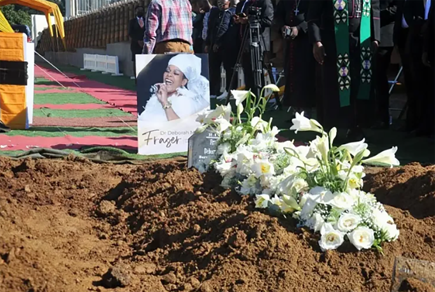 Never forgotten Touching scenes: Gospel star Deborah Fraser finally laid to rest 