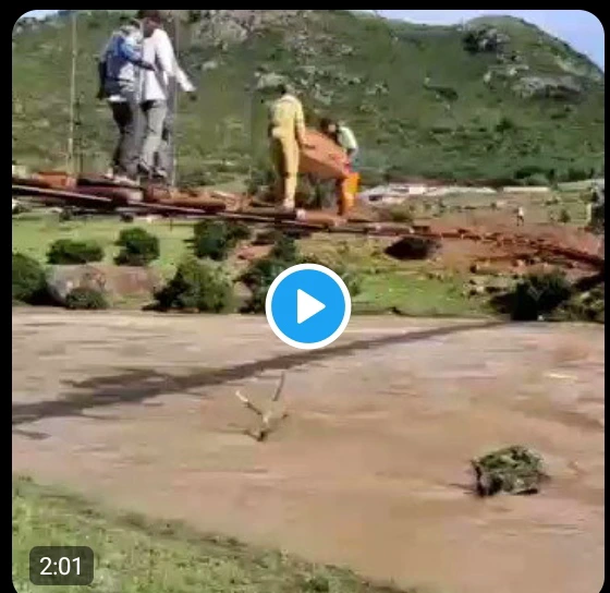 Watch: Men Carry Coffin Across Deadly Bridge Risking Their Lives
