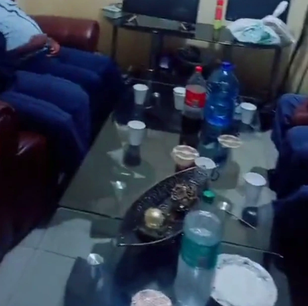 SAPS members caught on video having drinks with alleged foreigners while on duty